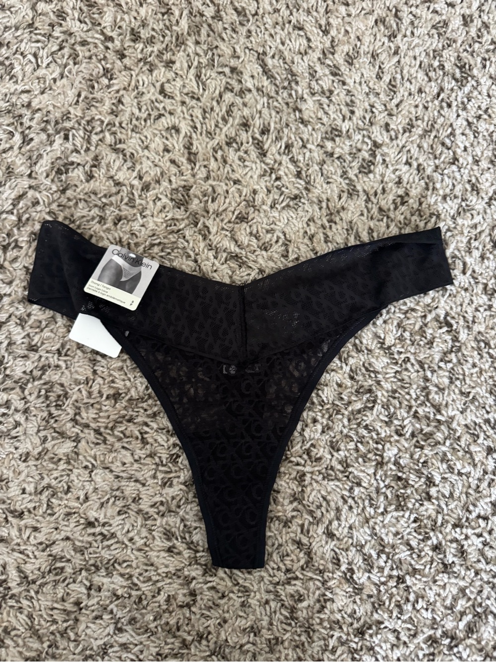 Brand New Calvin Klein Icon Lace Logo Thong in Black.